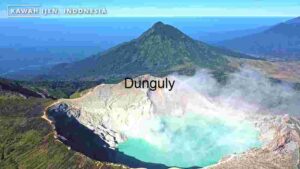 Rock Cliff in Volcano with Turquoise Sulfur Water Lake