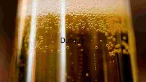 Close up bubble of beer in glass