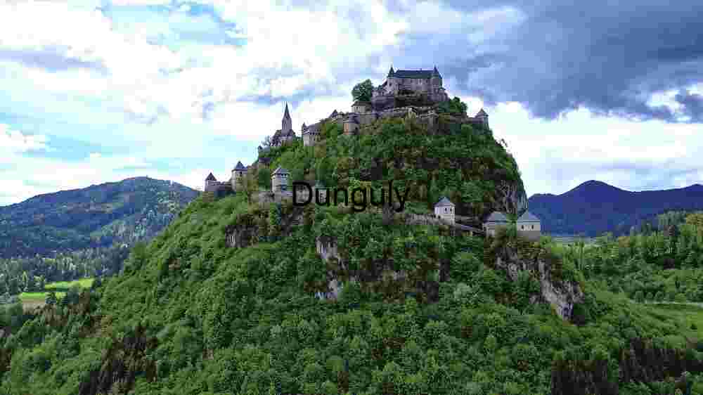 Discover Earth's remarkable landscapes. Behold breathtaking global views (120) Majestic Castle on a Verdant Hill