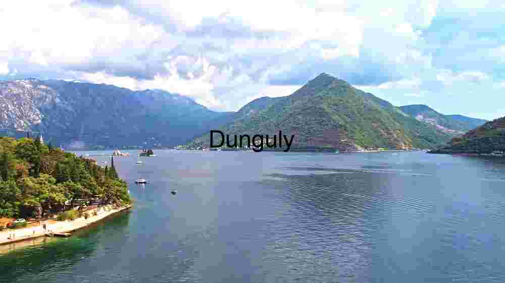 Discover Earth's remarkable landscapes. Behold breathtaking global views (123) Serene Lakeside with Mountain Pick