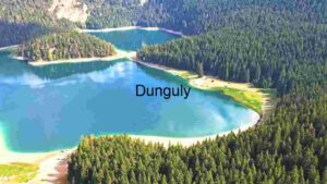 At Home Tranquil Alpine Lake Amidst Rugged Peaks