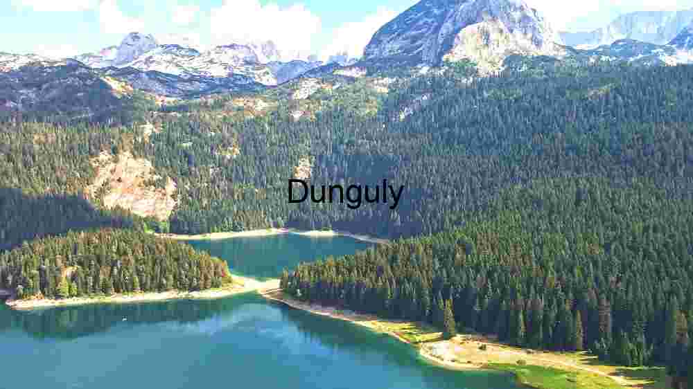 Discover Earth's remarkable landscapes. Behold breathtaking global views (184) Alpine Lake Amidst Rugged Peaks