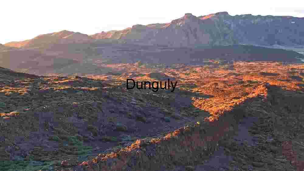 Discover Earth's remarkable landscapes. Behold breathtaking global views (54) rugged beauty of a mountainous landscape bathed in the warm glow of the golden hour