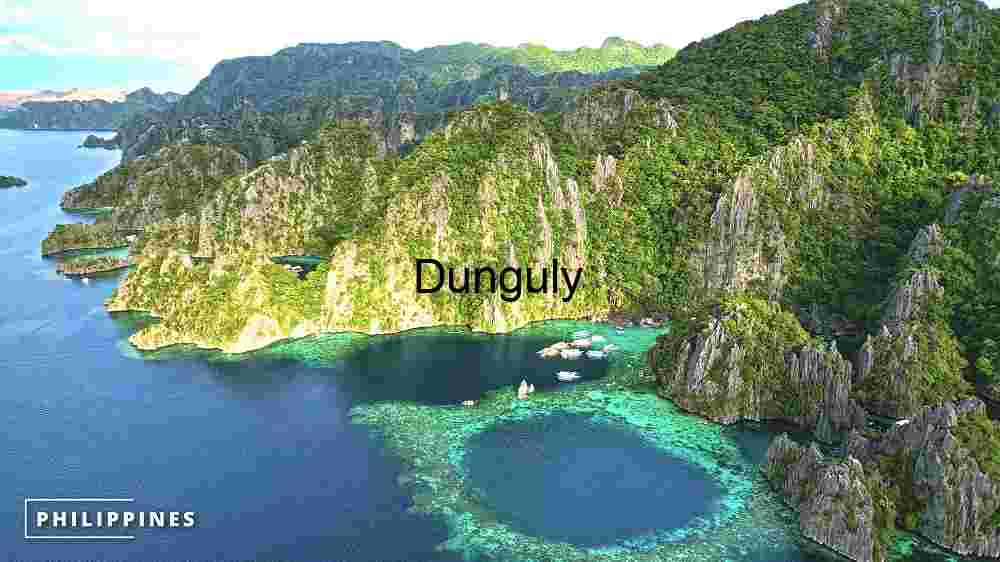 Reveal Earth's stunning terrain. Encounter breathtaking global vistas (13) Tropical Paradise: The Majestic Limestone Cliffs and Crystal Clear Waters of the Philippines