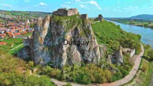 Historic Majesty: A Castle Overlooking a Serene River Bend