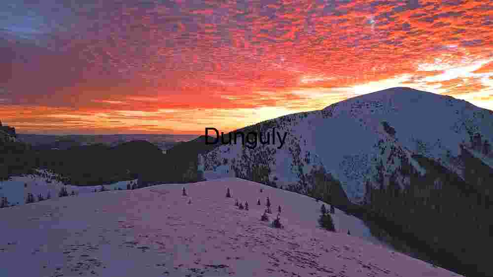 Uncover Earth's stunning landscapes. Experience breathtaking worldwide views (37) Sunset Symphony Over Snow-Capped Red Peaks