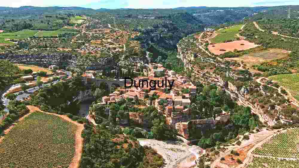 Uncover Earth's stunning landscapes. Experience breathtaking worldwide views (64) Idyllic Rural Landscape: Aerial View of a Traditional Village Amidst Lush Greenery