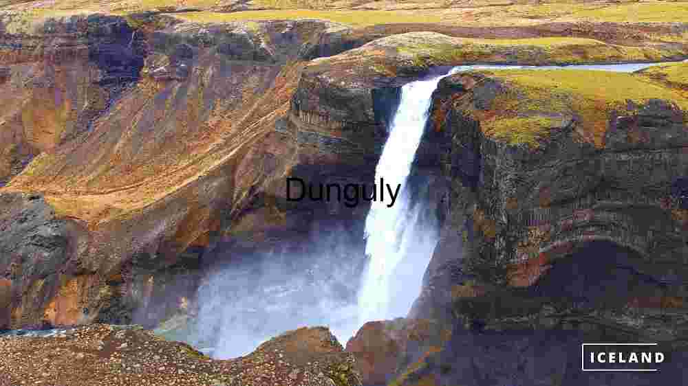 Uncover Earth's stunning landscapes. Experience breathtaking worldwide views (8) Majestic Waterfall in Iceland's Rugged Terrain