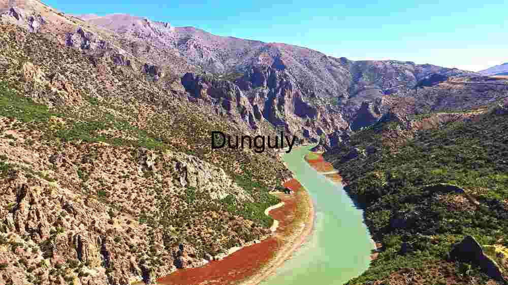 Astounding global destinations natural wonders, cultural treasures, and breathtaking views (78) Serene River Bend in a Mountainous Landscape