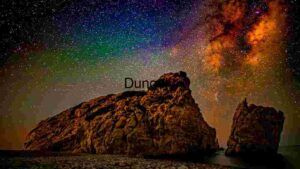 At Home Starry Night Over Rocky Shoreline