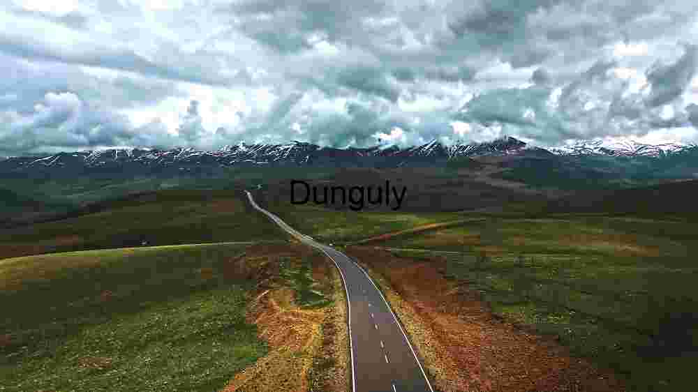 Astounding worldwide locales natural marvels, cultural treasures, and awe-inspiring panoramas (56) Serene Mountain Road Under Dramatic Skies