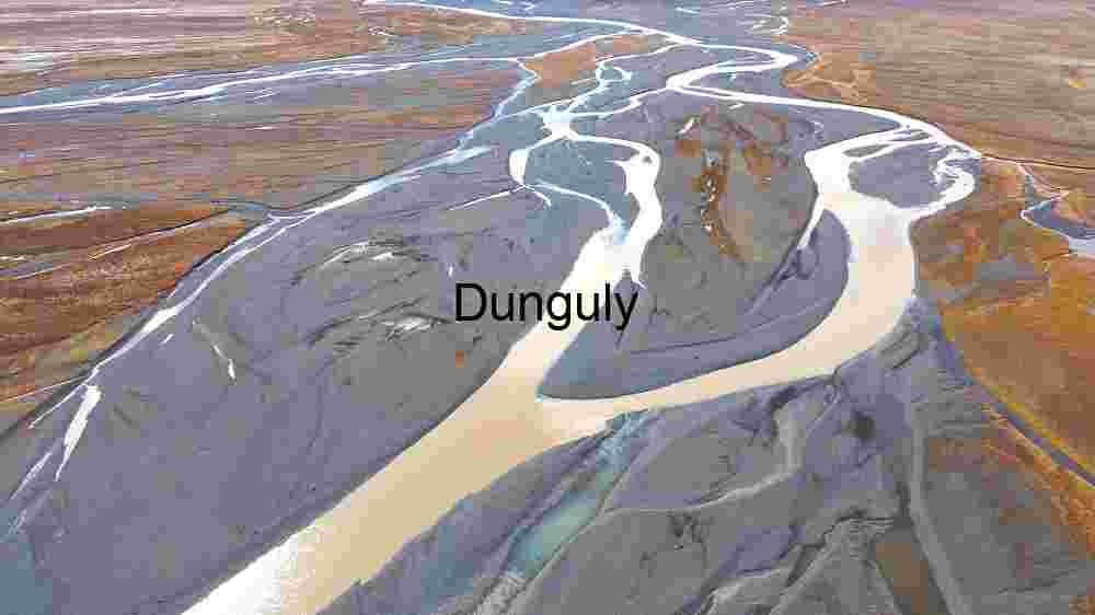 Capture the ethereal beauty of our planet from above through the lens of aerial photography, revealing the untouched splendor of its natural landscapes (38) Meandering River Through Arid Landscape