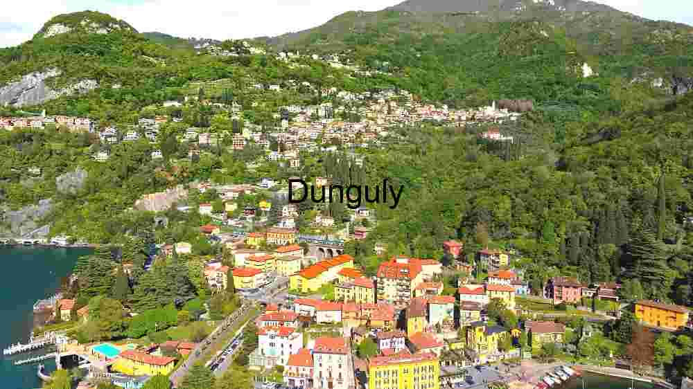 Capture the ethereal beauty of our planet from above through the lens of aerial photography, revealing the untouched splendor of its natural landscapes (43) Aerial View of a Picturesque Lakeside Town