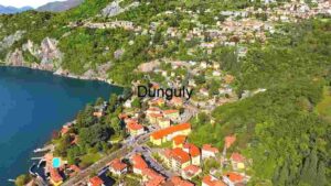 At Home Aerial View of Lakeside Town Nestled in Lush Greenery