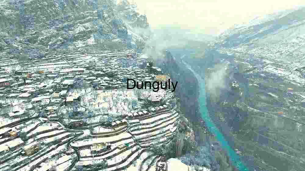 Capture the ethereal beauty of our planet from above through the lens of aerial photography, revealing the untouched splendor of its natural landscapes (81) Winter’s Embrace on a Mountainous Village