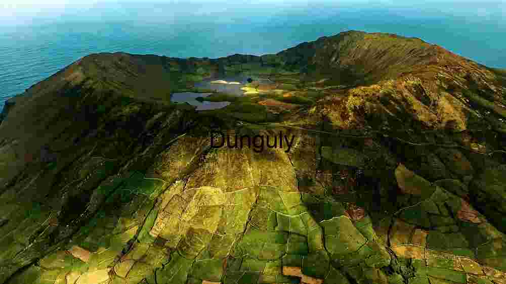 Incredible global spots nature wonders, cultural gems, and breathtaking vistas (51) Aerial View of a Volcanic Crater with Farmland