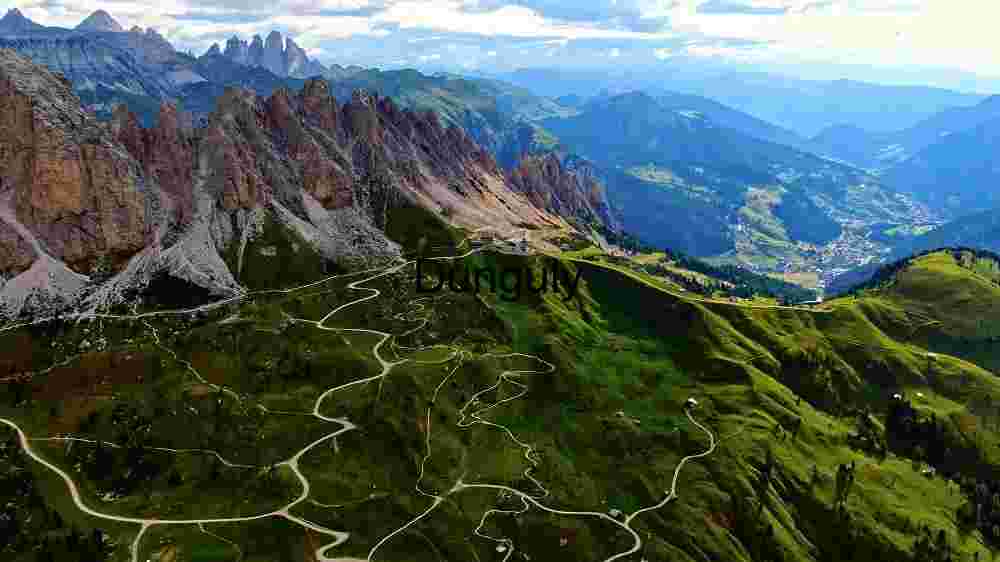 Incredible global spots nature wonders, cultural gems, and breathtaking vistas (76) Majestic Mountain Range with Winding Trails