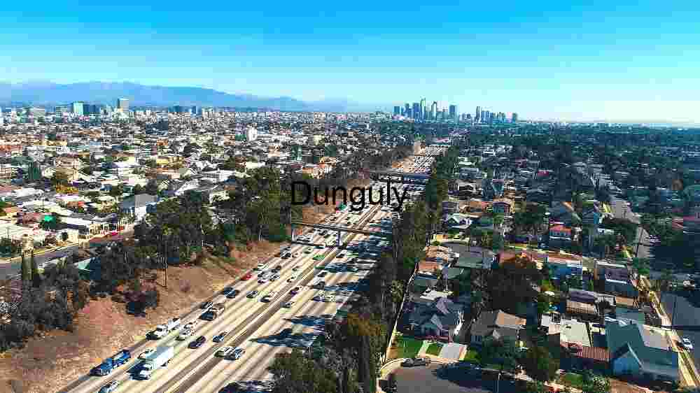 Unveiling the Celestial Fabric Embracing the Abundance of Diversity Across Earth's Expansive Terrains (68) Aerial View of Bustling Cityscape and Highway
