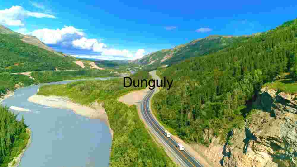 Witness Earth's innate splendor from above. Explore and professionally capture its natural beauty (122) Serene Aerial View of a Winding Road Along a River