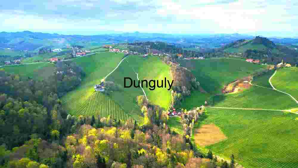 Witness Earth's innate splendor from above. Explore and professionally capture its natural beauty (26) Verdant Hills and Farmhouses: Aerial View