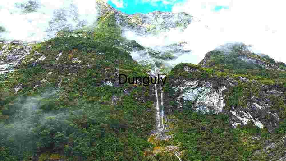 Witness Earth's innate splendor from above. Explore and professionally capture its natural beauty (48) Majestic Mountain Waterfall