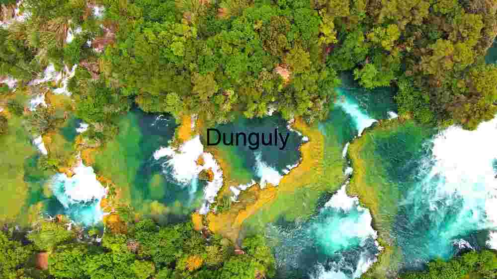 Witness Earth's innate splendor from above. Explore and professionally capture its natural beauty (99) Aerial View of a Vibrant Waterfall Oasis