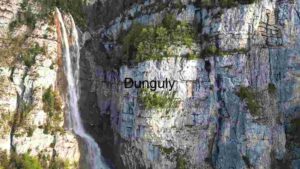 At Home Majestic Waterfall Amidst Rugged Cliffs