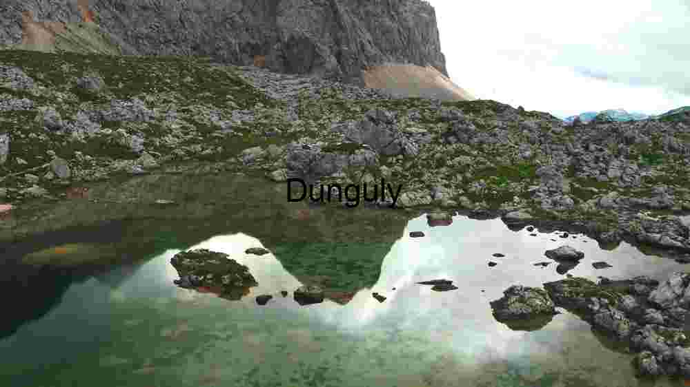 Cosmic Earth Capturing the Rich Diversity of Our Planets Regions (71) Alpine Mountain Reflection in a Rocky Pond