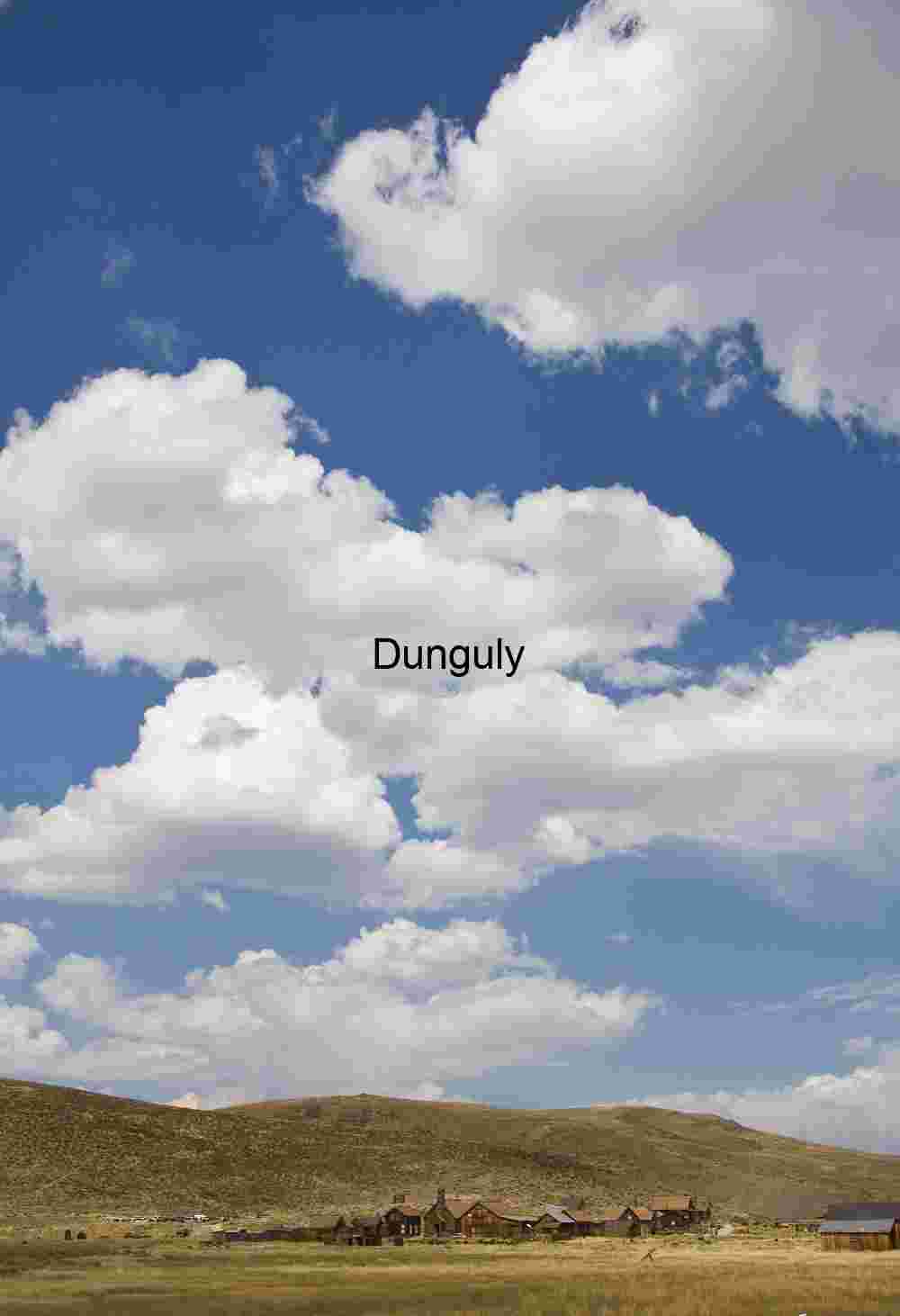 Bodie_Ghost_Town_Small_town_big_sky Scenic View of a Ghost Town Under a Blue Sky with Clouds