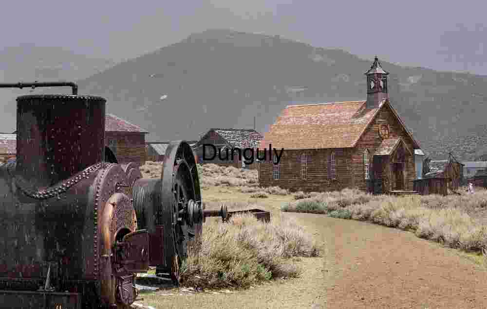 Steam_boiler_and_church_Bodie_ghost_town Abandoned Mining Town in the Snow