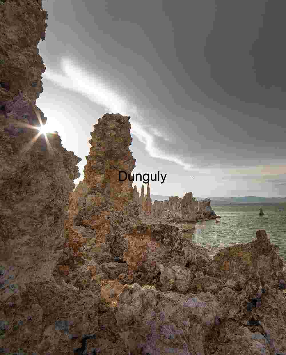 Backlit tufa and Sierra wave cloud- Mono Lake Radiant Divide: Tufa Towers and Flight Beneath a Stormlit Sky