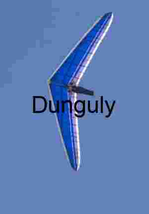 Hang Glider in Clear Blue Sky — Aerial Adventure and Freedom in Flight