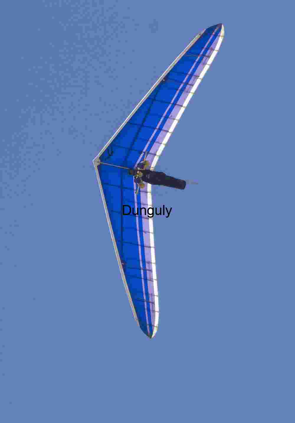 Blue glider airborne Hang Glider in Clear Blue Sky — Aerial Adventure and Freedom in Flight