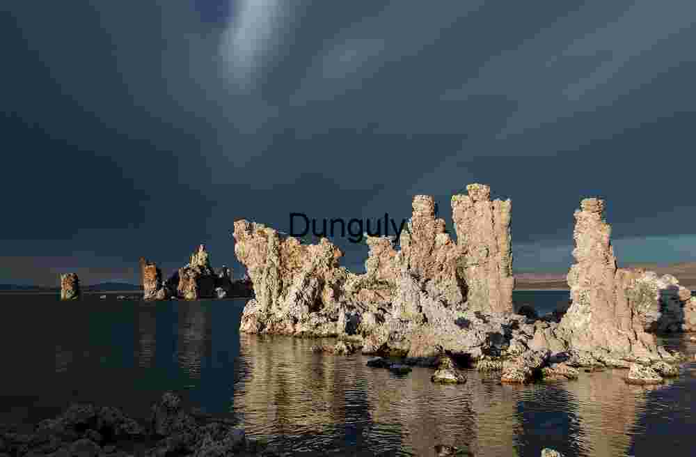 Chiaroscuro light on the tufa, Mono Lake Stormlight Over Stone: Tufa Towers and Flight at Mono Lake