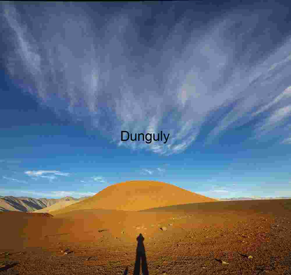 Cinder cone with photogrpher's shadow Golden Sand Dune with Photographer’s Shadow — Desert Landscape Photography