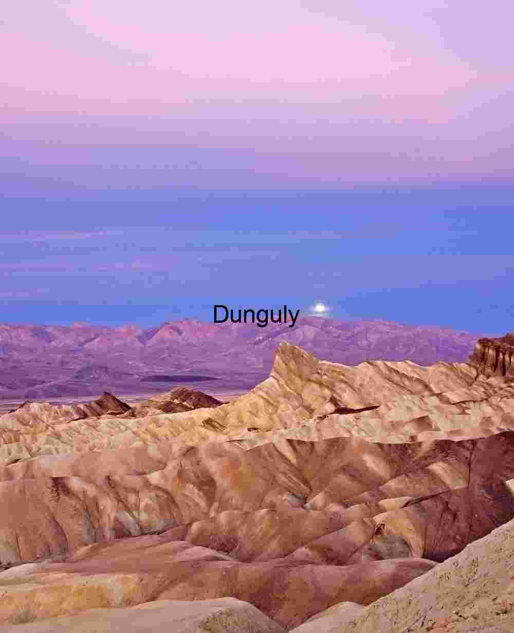 Death Valley - Zabriskie point moonset at sunrise Twilight Reverie: Desert Ridges Beneath a Painted Sky