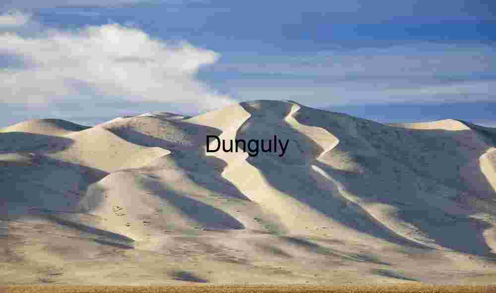 Eureka Dunes - wind contours and clouds Whispers in White: Sculpted Dunes Beneath a Quiet Sky