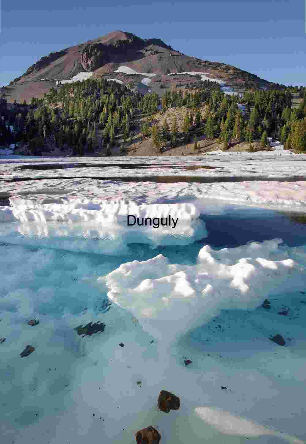Ice patterns on Lake Helen and Lassen Peak- Lassen National Park Thaw and Timber: Ice Floats Beneath Alpine Shadows