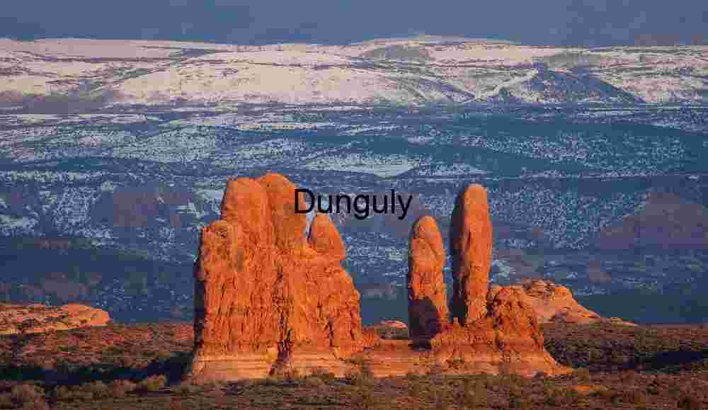 Pillars of the earth, Arches National Park Red Rock Spires and Snow‑Capped Mesas – Desert Winter Landscape Photography