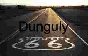 Route 66 Emblem on Desert Highway at Sunset