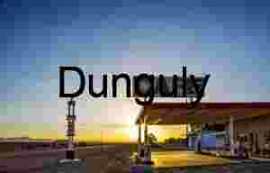 Sunset Glow Over Desert Café and Gas Station in Remote Landscape