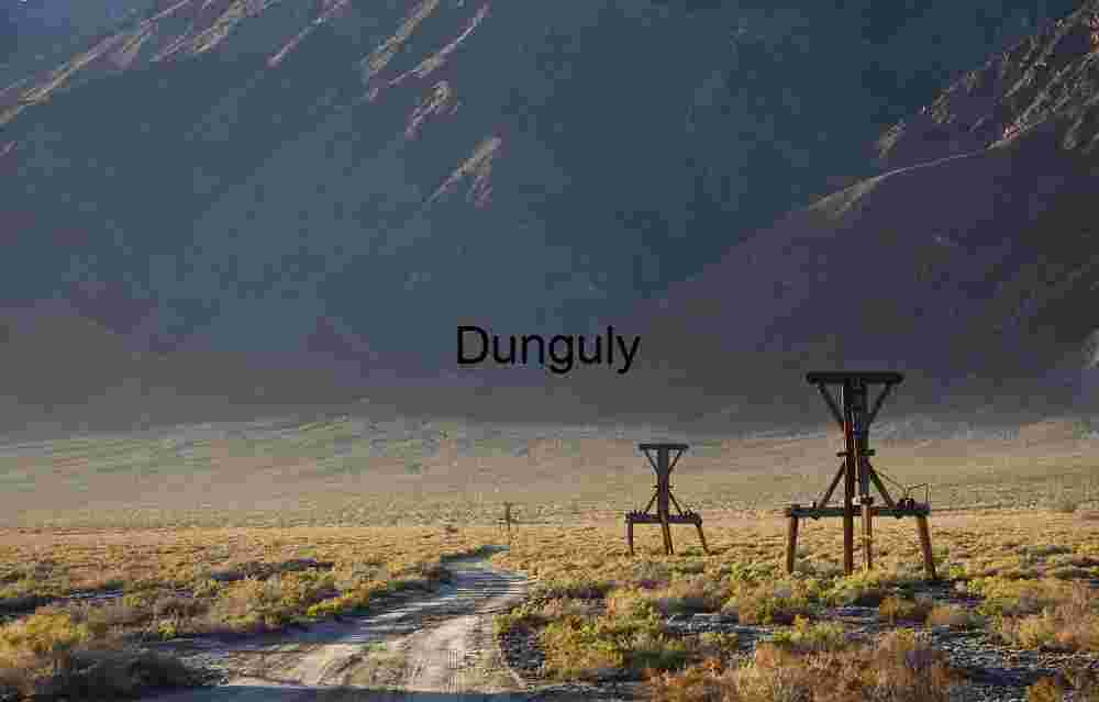 Salt Tramway towers and road to Daisy Canyon Rusting Oil Derrick Against Rugged Peaks