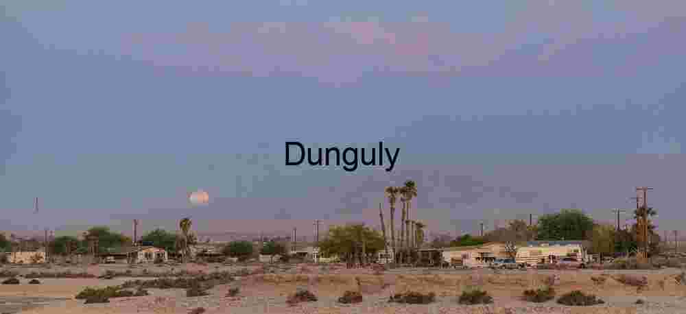Salton City moonset; Salton Sea Moonrise Over Desert Townscape at Twilight