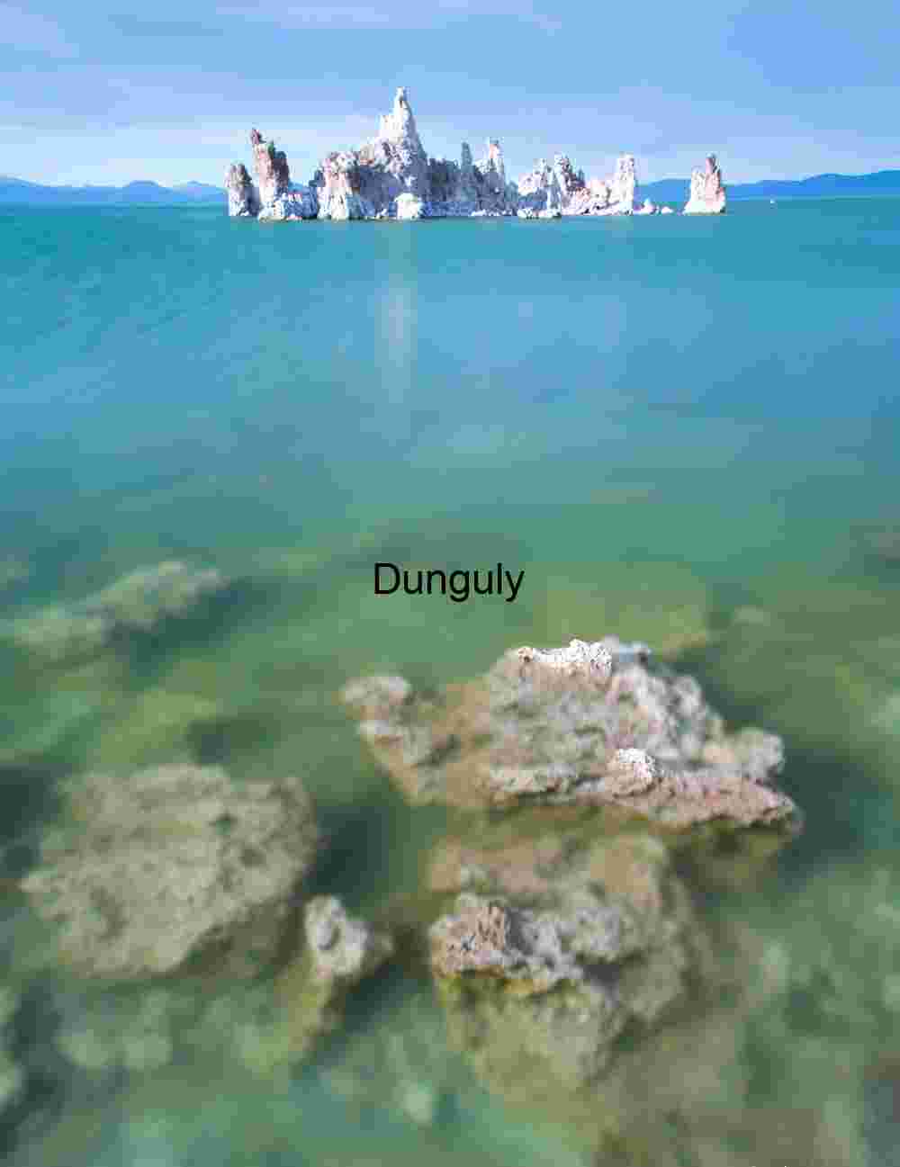 Submerged tufa and aquamarine lake, Mono Lake Tufa Towers and Submerged Rocks in Clear Waters of Mono Lake