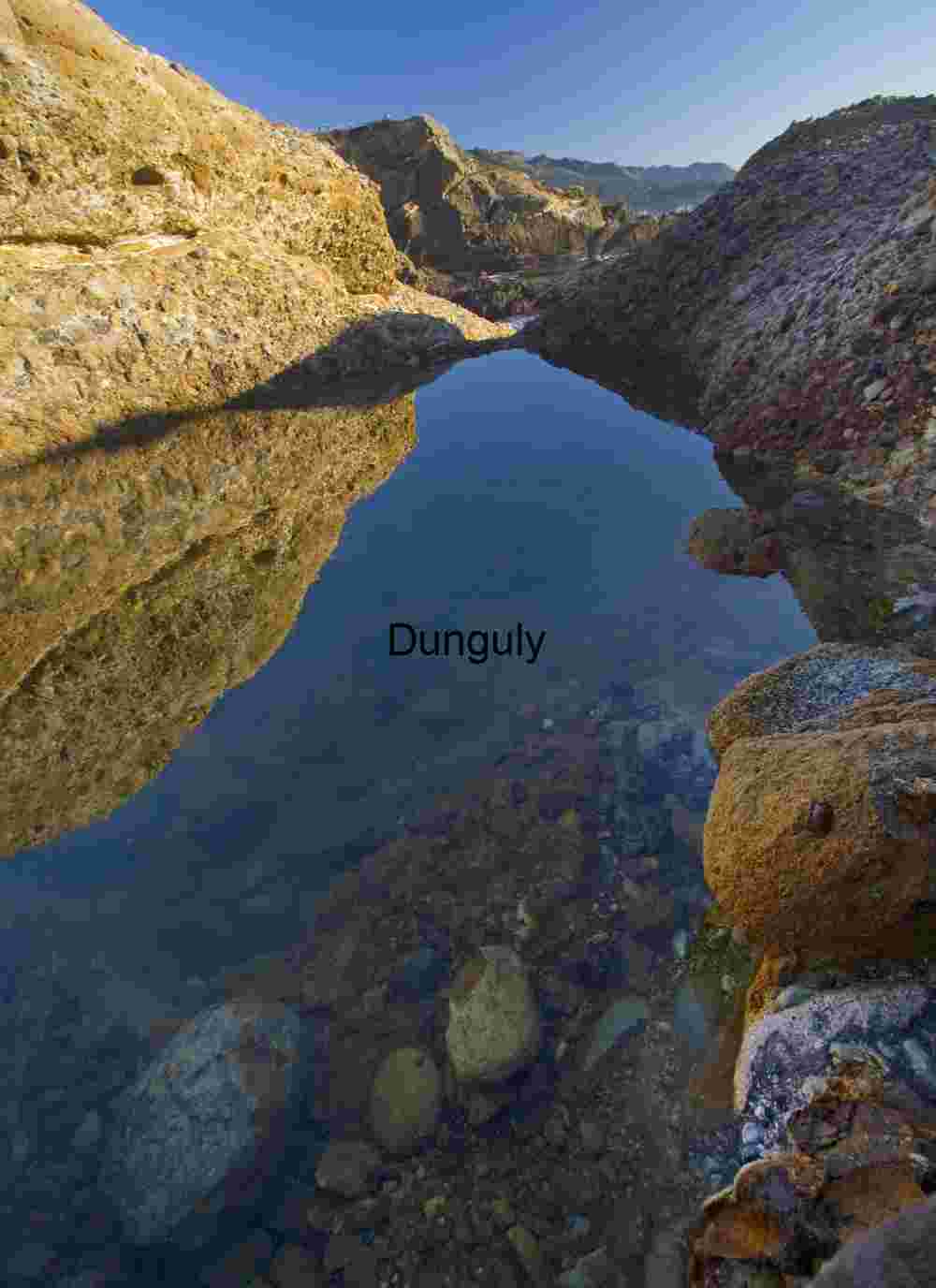 Tide Pool, Point Lobos Geological Water Pocket in Arid Canyon with Transparent Stream