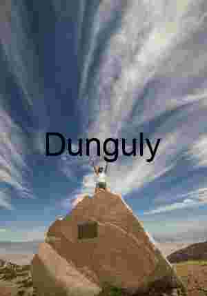 Triumphant Figure on Mountain Summit Rock – Dramatic Sky and Victorious Pose Landscape Photography