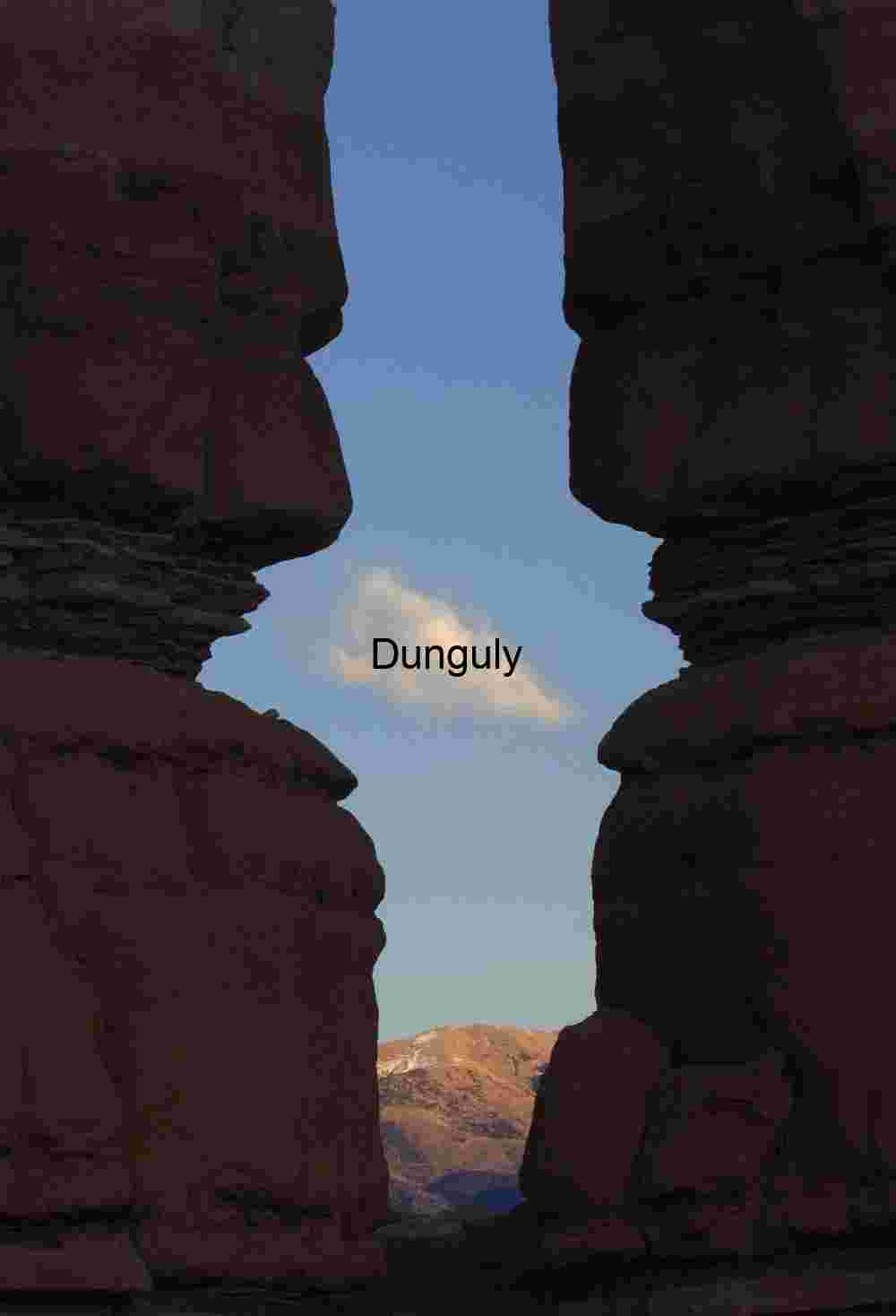 Henry Mountains through pillars by Notom road Henry Mountains through pillars by Notom road