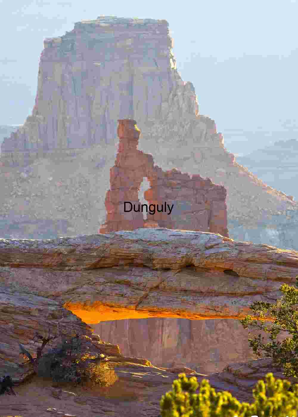 Mesa Arch and Washerwoman Arch Mesa Arch Sunrise Glow: Canyonlands National Park