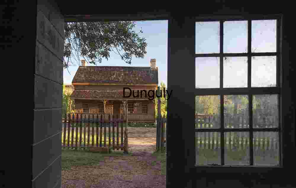 Russell Home framed through doorway of Louisa Marie Russell Home Russell Home framed through doorway of Louisa Marie Russell Home