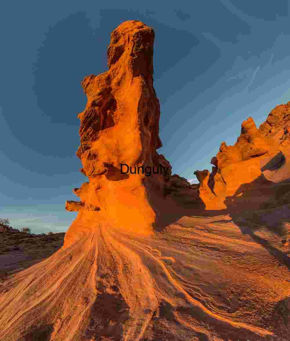 beastie Beastie: Swirling Rock Formation at Sunset
